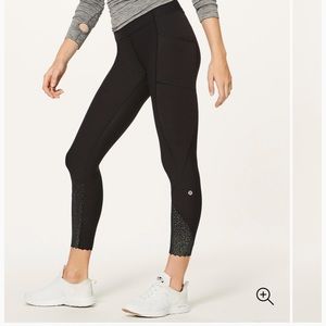 Lululemon leggings reflective scalloped ankles.